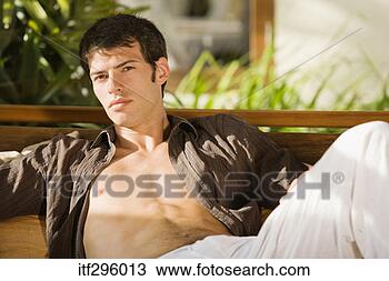 Stock Photo - portrait of man 
lounging. fotosearch 
- search stock 
photos, pictures, 
images, and photo 
clipart