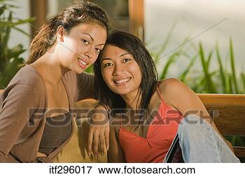 Picture - portrait of two 
women. fotosearch 
- search stock 
photos, pictures, 
images, and photo 
clipart