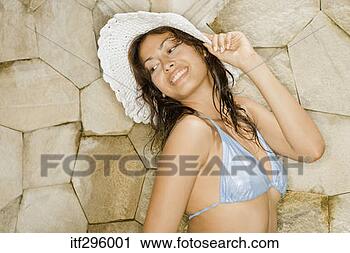 Stock Photography - woman in bikini 
and sun hat. fotosearch 
- search stock 
photos, pictures, 
images, and photo 
clipart