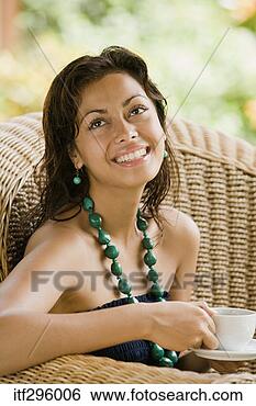 Stock Photo - woman smiling 
with cup of coffee. 
fotosearch - search 
stock photos, 
pictures, images, 
and photo clipart