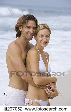 Stock Photo - couple on a beach. 
fotosearch - search 
stock photos, 
pictures, images, 
and photo clipart