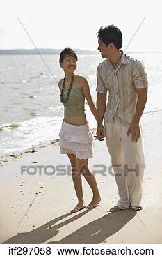Stock Photo - couple on a beach. 
fotosearch - search 
stock photos, 
pictures, images, 
and photo clipart