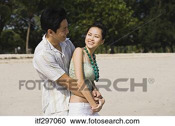 Stock Photography - couple on a beach. 
fotosearch - search 
stock photos, 
pictures, images, 
and photo clipart
