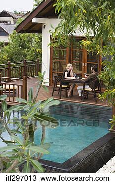 Stock Photo - couple dining 
outdoors. fotosearch 
- search stock 
photos, pictures, 
images, and photo 
clipart