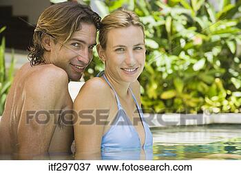 Picture - couple in a pool. 
fotosearch - search 
stock photos, 
pictures, images, 
and photo clipart