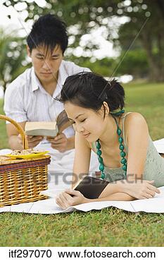 Stock Photography - couple reading 
and picnicking. 
fotosearch - search 
stock photos, 
pictures, images, 
and photo clipart