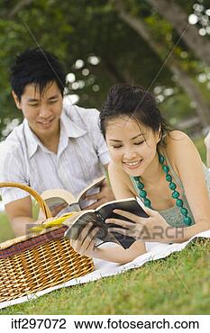 Stock Photo - couple reading 
and picnicking. 
fotosearch - search 
stock photos, 
pictures, images, 
and photo clipart