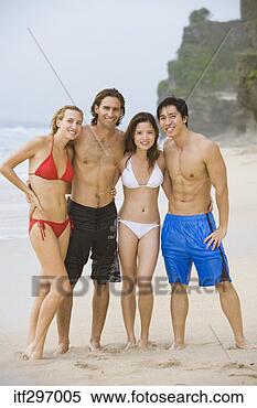 Stock Image - couples on a beach. 
fotosearch - search 
stock photos, 
pictures, images, 
and photo clipart