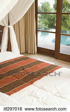 Stock Photo - four poster bed. 
fotosearch - search 
stock photos, 
pictures, images, 
and photo clipart