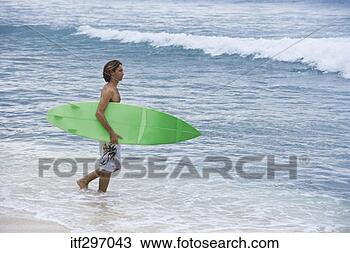 Stock Photo - man with a surfboard. 
fotosearch - search 
stock photos, 
pictures, images, 
and photo clipart