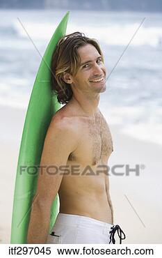 Stock Image - man with a surfboard. 
fotosearch - search 
stock photos, 
pictures, images, 
and photo clipart