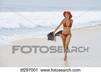 Stock Photography - woman on a beach. 
fotosearch - search 
stock photos, 
pictures, images, 
and photo clipart