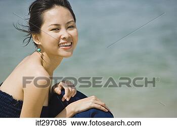 Stock Image - woman by an ocean. 
fotosearch - search 
stock photos, 
pictures, images, 
and photo clipart