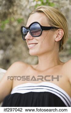 Stock Photo - woman with sunglasses. 
fotosearch - search 
stock photos, 
pictures, images, 
and photo clipart