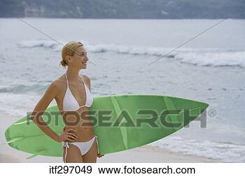 Stock Photograph - woman with a surfboard. 
fotosearch - search 
stock photos, 
pictures, images, 
and photo clipart