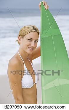 Stock Photography - woman with a surfboard. 
fotosearch - search 
stock photos, 
pictures, images, 
and photo clipart