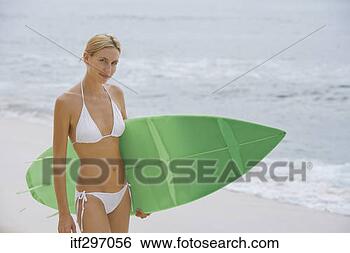 Stock Photo - woman with a surfboard. 
fotosearch - search 
stock photos, 
pictures, images, 
and photo clipart