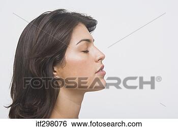 Stock Photo - woman with eyes 
shut. fotosearch 
- search stock 
photos, pictures, 
images, and photo 
clipart
