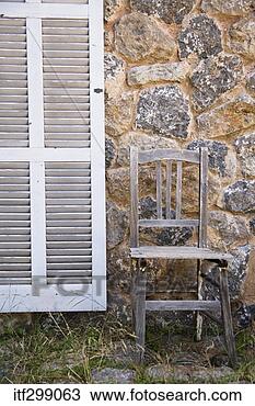 Stock Photo - chair near wall. 
fotosearch - search 
stock photos, 
pictures, images, 
and photo clipart