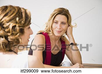 Stock Photograph - friends talking. 
fotosearch - search 
stock photos, 
pictures, images, 
and photo clipart