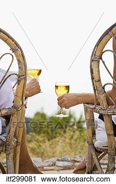 Stock Photography - people holding 
wine glasses. 
fotosearch - search 
stock photos, 
pictures, images, 
and photo clipart