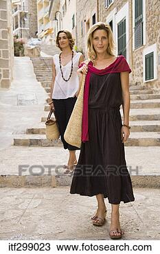 Stock Photo - women standing 
outdoors. fotosearch 
- search stock 
photos, pictures, 
images, and photo 
clipart
