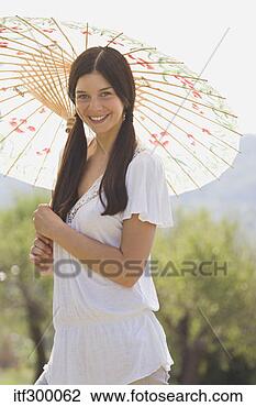 Stock Photo - woman with parasol. 
fotosearch - search 
stock photos, 
pictures, images, 
and photo clipart