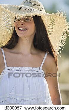 Picture - woman in sun hat. 
fotosearch - search 
stock photos, 
pictures, images, 
and photo clipart