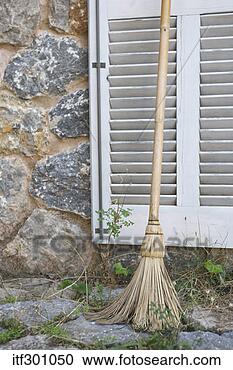 Stock Photography - broom by a shutter. 
fotosearch - search 
stock photos, 
pictures, images, 
and photo clipart