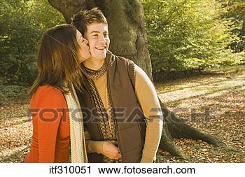 Stock Photography - affectionate couple 
outdoors. fotosearch 
- search stock 
photos, pictures, 
images, and photo 
clipart