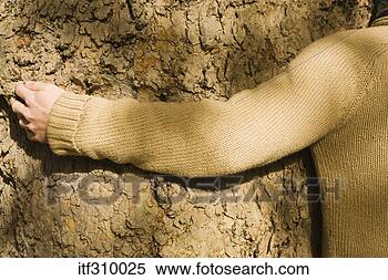 Stock Image - person hugging 
tree. fotosearch 
- search stock 
photos, pictures, 
images, and photo 
clipart