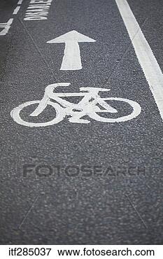 Picture - bike lane arrow 
painted on street. 
fotosearch - search 
stock photos, 
pictures, images, 
and photo clipart