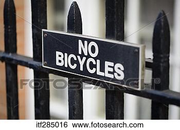 Stock Photo - no bicycles sign 
on fence. fotosearch 
- search stock 
photos, pictures, 
images, and photo 
clipart