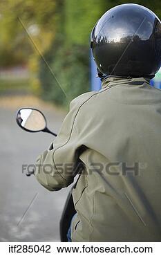 Stock Photo - riding scooter 
with rearview 
mirror. fotosearch 
- search stock 
photos, pictures, 
images, and photo 
clipart