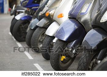 Stock Photo - row of parked 
motorcycles. fotosearch 
- search stock 
photos, pictures, 
images, and photo 
clipart