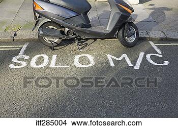 Stock Photo - scooter in parking 
spot on street. 
fotosearch - search 
stock photos, 
pictures, images, 
and photo clipart