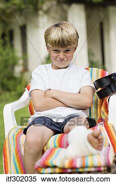 Stock Image - boy with leg cast. 
fotosearch - search 
stock photos, 
pictures, images, 
and photo clipart