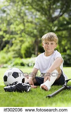 Stock Photo - boy soccer player 
with injury. fotosearch 
- search stock 
photos, pictures, 
images, and photo 
clipart