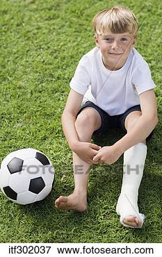 Picture - boy soccer player 
with injury. fotosearch 
- search stock 
photos, pictures, 
images, and photo 
clipart