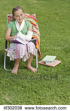 Stock Photo - girl in arm cast 
reading book. 
fotosearch - search 
stock photos, 
pictures, images, 
and photo clipart