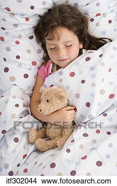 Stock Photo - girl sleeping 
with teddy bear. 
fotosearch - search 
stock photos, 
pictures, images, 
and photo clipart