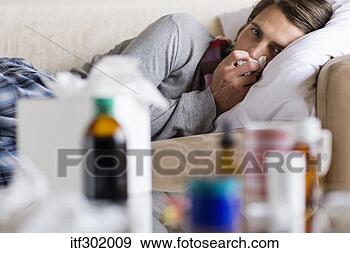 Stock Photograph - sick man resting 
by medicine. fotosearch 
- search stock 
photos, pictures, 
images, and photo 
clipart