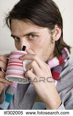 Stock Image - sick man sipping 
tea. fotosearch 
- search stock 
photos, pictures, 
images, and photo 
clipart