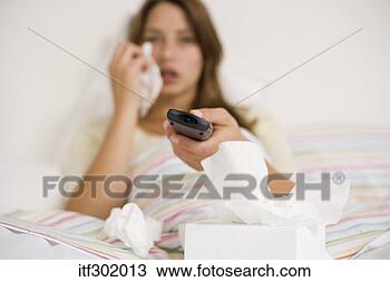 Stock Photo - sick woman in 
bed with remote. 
fotosearch - search 
stock photos, 
pictures, images, 
and photo clipart