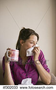Stock Photo - sick woman blowing 
nose. fotosearch 
- search stock 
photos, pictures, 
images, and photo 
clipart