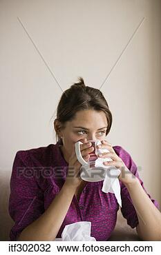 Stock Photo - sick woman sipping 
tea. fotosearch 
- search stock 
photos, pictures, 
images, and photo 
clipart