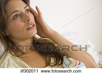 Stock Photography - woman with headache. 
fotosearch - search 
stock photos, 
pictures, images, 
and photo clipart