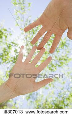 Stock Photo - hands outstretched 
outdoors. fotosearch 
- search stock 
photos, pictures, 
images, and photo 
clipart