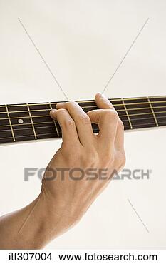 Banco de Imagem - mão,  tocando, 
 guitarra. fotosearch 
- busca de fotos, 
imagens e clipart