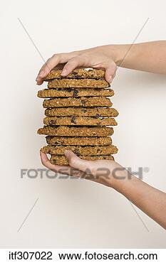 Banco de Imagem - mãos,  pilha, 
 biscoitos. fotosearch 
- busca de fotos, 
imagens e clipart